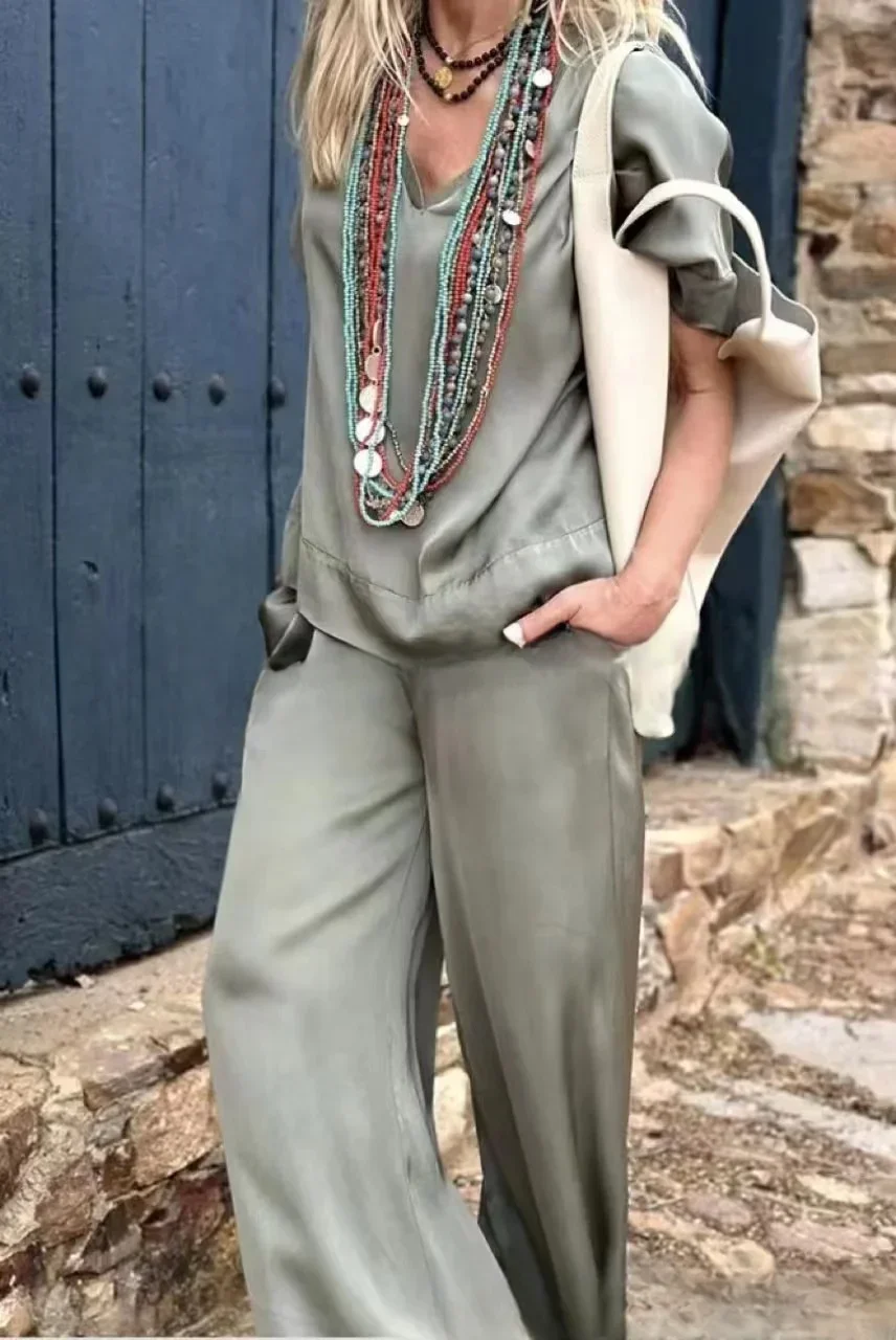2024 Spring Oversize Women Suit White V-neck Short Sleeve Tops Long Pants Loose Suits Female Casual Elegant Fashion Lady Clothes
2024 Spring Oversize Women Suit White V-neck Short Sleeve Tops Long Pants Loose Suits Female Casual Elegant Fashion Lady Clothes