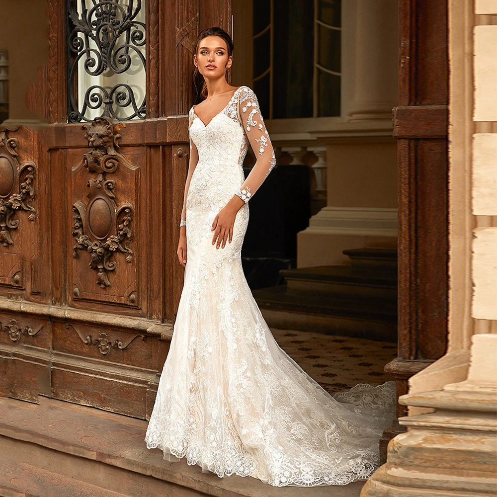 2023 Luxury Lace Wedding Dress Illusion Long Sleeve V Neck Sweep Train Applique Backless Mermaid Bridal Gown Robe De Mariee
2023 Luxury Lace Wedding Dress Illusion Long Sleeve V Neck Sweep Train Applique Backless Mermaid Bridal Gown Robe De Mariee