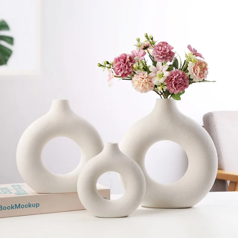 Nordic Circular Hollow Ceramic Vase Modern Donuts Flower Pot Accessories For Living Room Decoration Home Office Desktop Decor
Nordic Circular Hollow Ceramic Vase Modern Donuts Flower Pot Accessories For Living Room Decoration Home Office Desktop Decor
