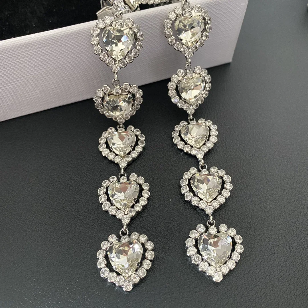 Top Quality Heart Crystal Long Silver Colour Earrings Ear Clip Lovely Luxury Jewelry Trend
Top Quality Heart Crystal Long Silver Colour Earrings Ear Clip Lovely Luxury Jewelry Trend