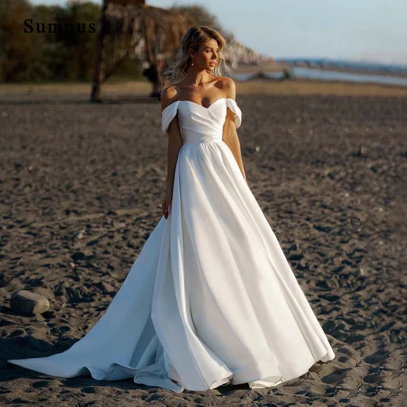 Simple Satin Beach Wedding Dress Off the Shoulder V-neck Back Zipper Elegant Bride Gown Long A-line Wedding Party Gowns
Simple Satin Beach Wedding Dress Off the Shoulder V-neck Back Zipper Elegant Bride Gown Long A-line Wedding Party Gowns