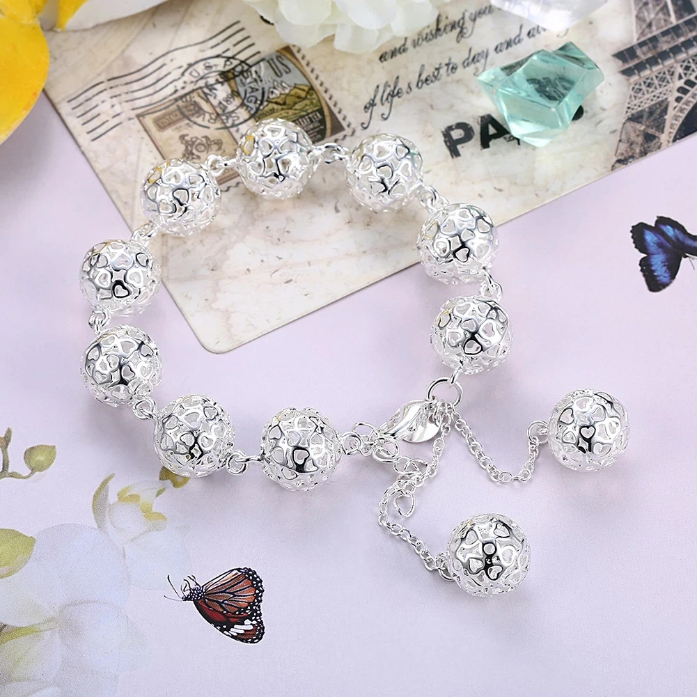 Hot Pretty Hollow heart ball 925 Sterling silver Bracelet for woman fashion brands Wedding party Jewelry Christmas Gifts
Hot Pretty Hollow heart ball 925 Sterling silver Bracelet for woman fashion brands Wedding party Jewelry Christmas Gifts