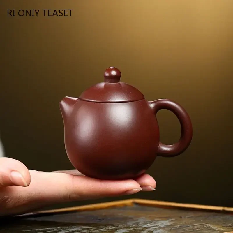 100ml Chinese Yixing Famous Purple Clay Teapots Handmade Dragon Egg Tea Pot Raw Ore Purple Zhu Mud Kettle Zisha Tea Set Teaware
100ml Chinese Yixing Famous Purple Clay Teapots Handmade Dragon Egg Tea Pot Raw Ore Purple Zhu Mud Kettle Zisha Tea Set Teaware