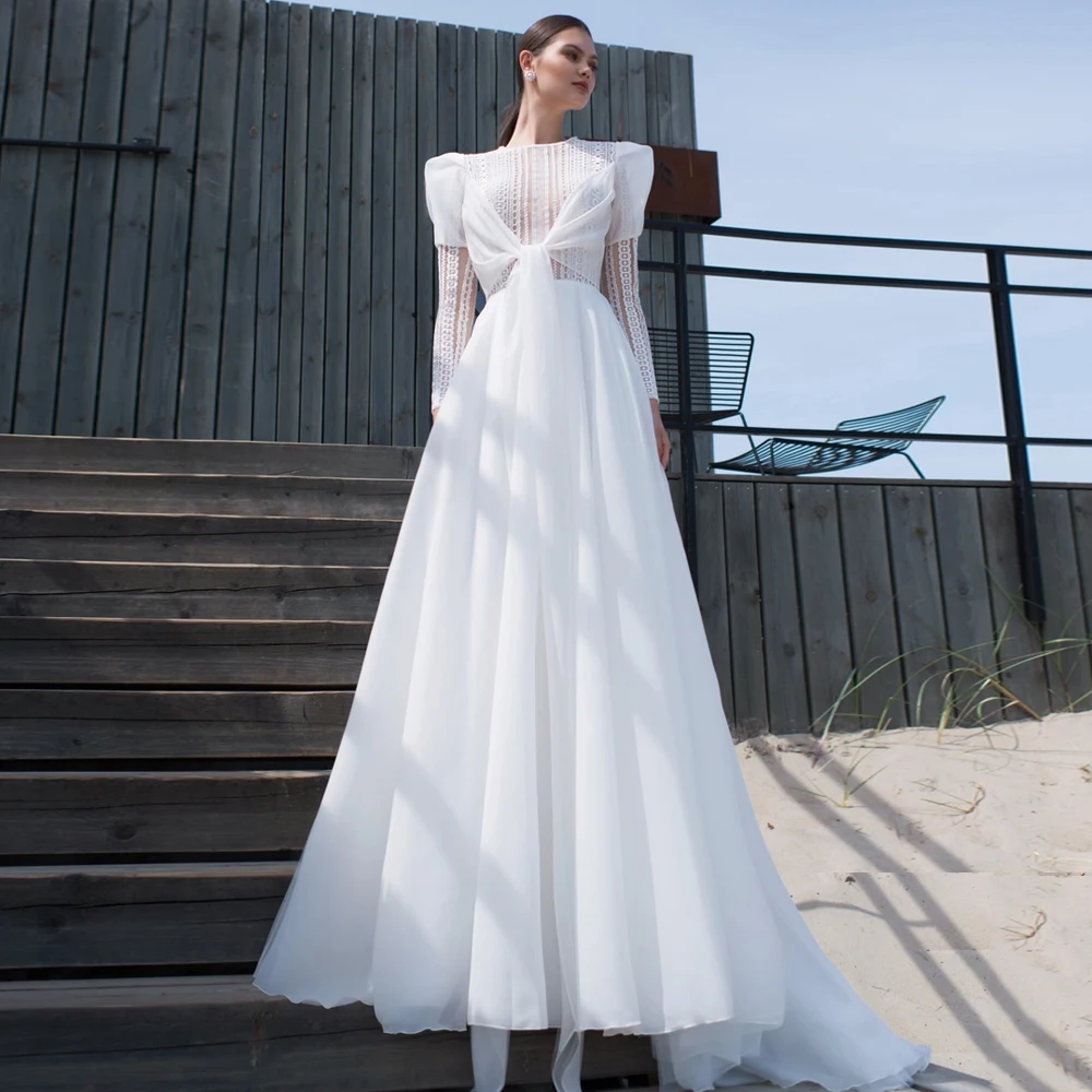 

Elegant White Wedding Dresses Jewel Neck Long Sleeves A-Line Bridal Gowns Lace Appliques Sweep Train Illusion Vestidos De Novia