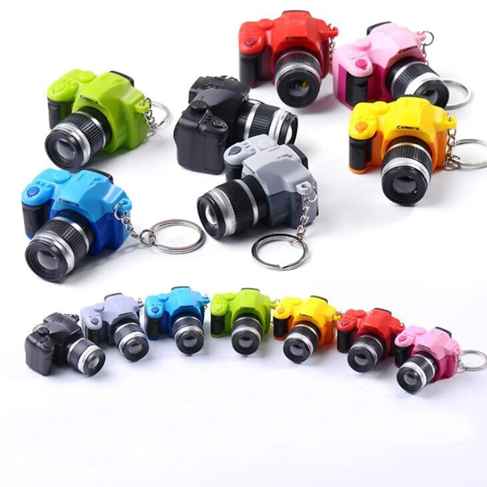 Kids Simulation Camera Flashing Led Toy Keychain Luminous Camera Cute Key Ring Bag Pendant Ornaments Toys for Kids Adult Gift
Kids Simulation Camera Flashing Led Toy Keychain Luminous Camera Cute Key Ring Bag Pendant Ornaments Toys for Kids Adult Gift