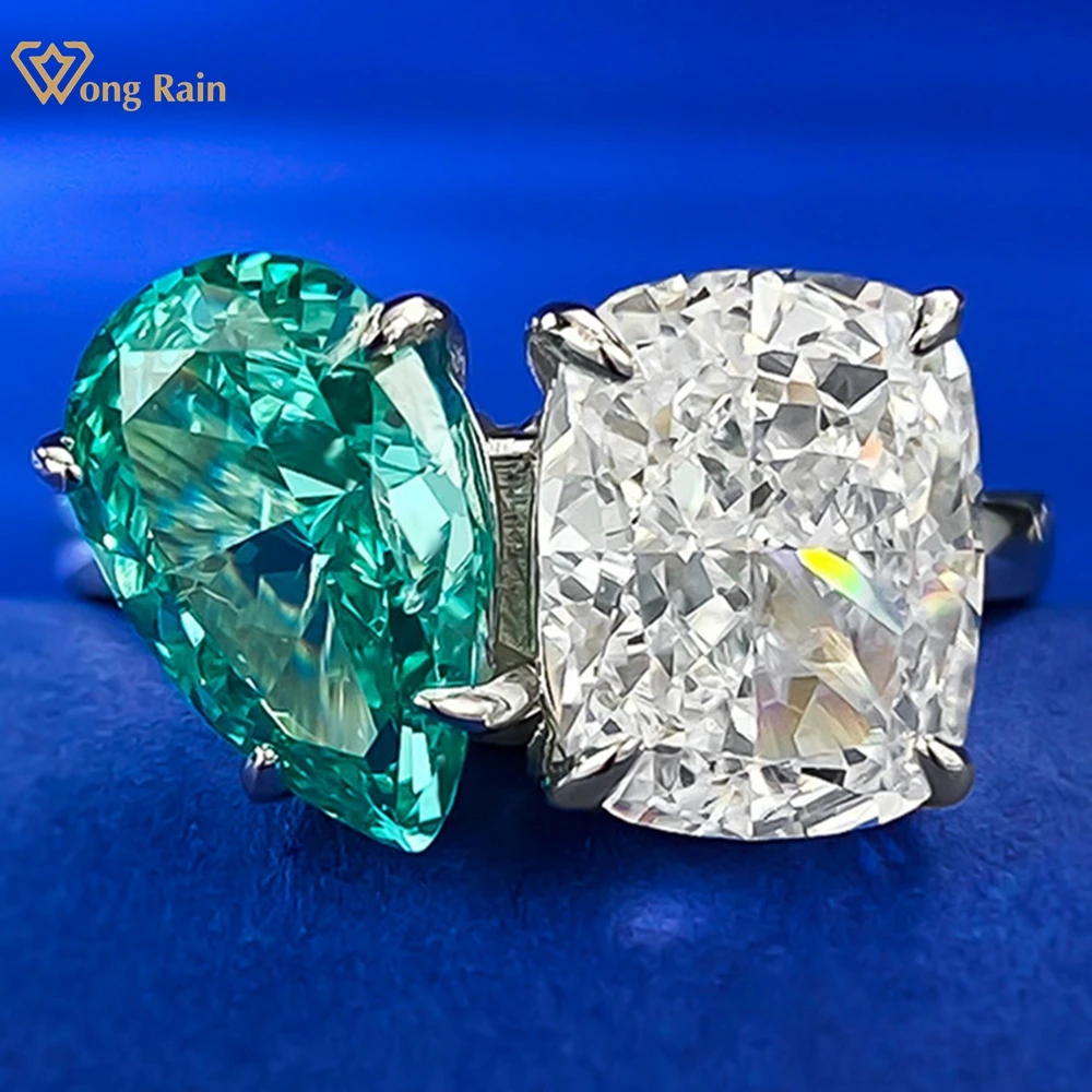 

Wong Rain Elegant 925 Sterling Silver 7*11 MM Crushed Ice Cut Paraiba Tourmaline Gemstone Ring for Women Fine Wedding Jewelry