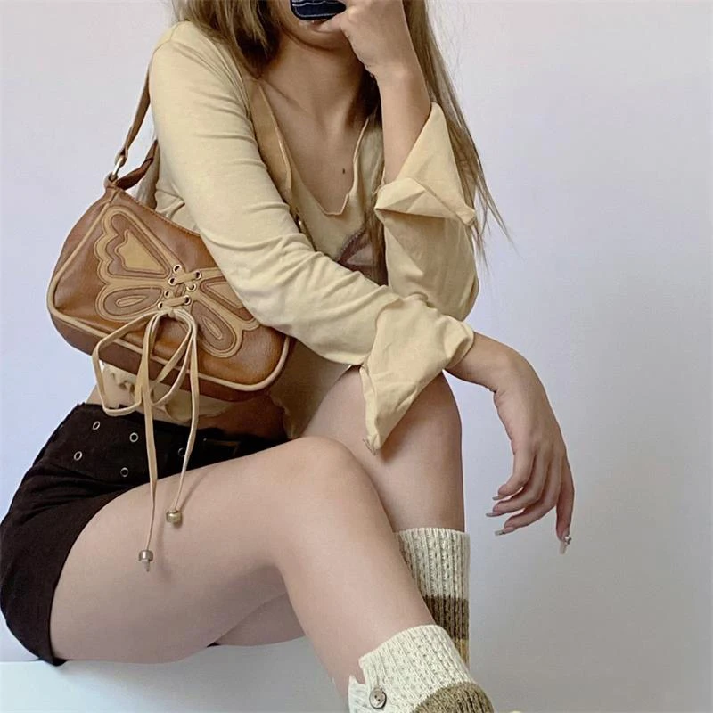 Винтажная коричневая сумка с вышивкой бабочки, сумки через плечо, сумка, универсальная трендовая нишевая дизайнерская сумка для подмышек, модный аксессуар
Винтажная коричневая сумка с вышивкой бабочки, сумки через плечо, сумка, универсальная трендовая нишевая дизайнерская сумка для подмышек, модный аксессуар