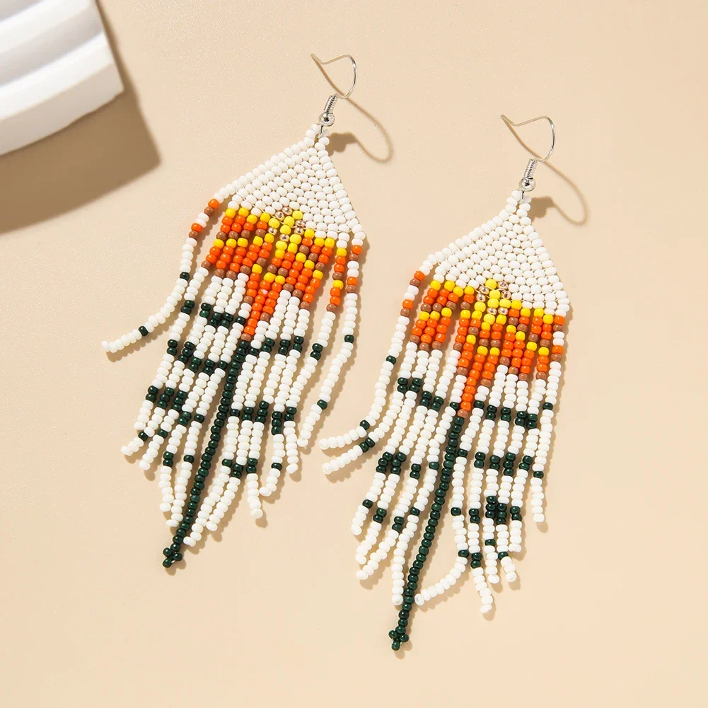 

Fringed earrings Hand woven Retro Versatile flower Beading Simplicity Bohemia alloy ma'am Rice bead earrings
