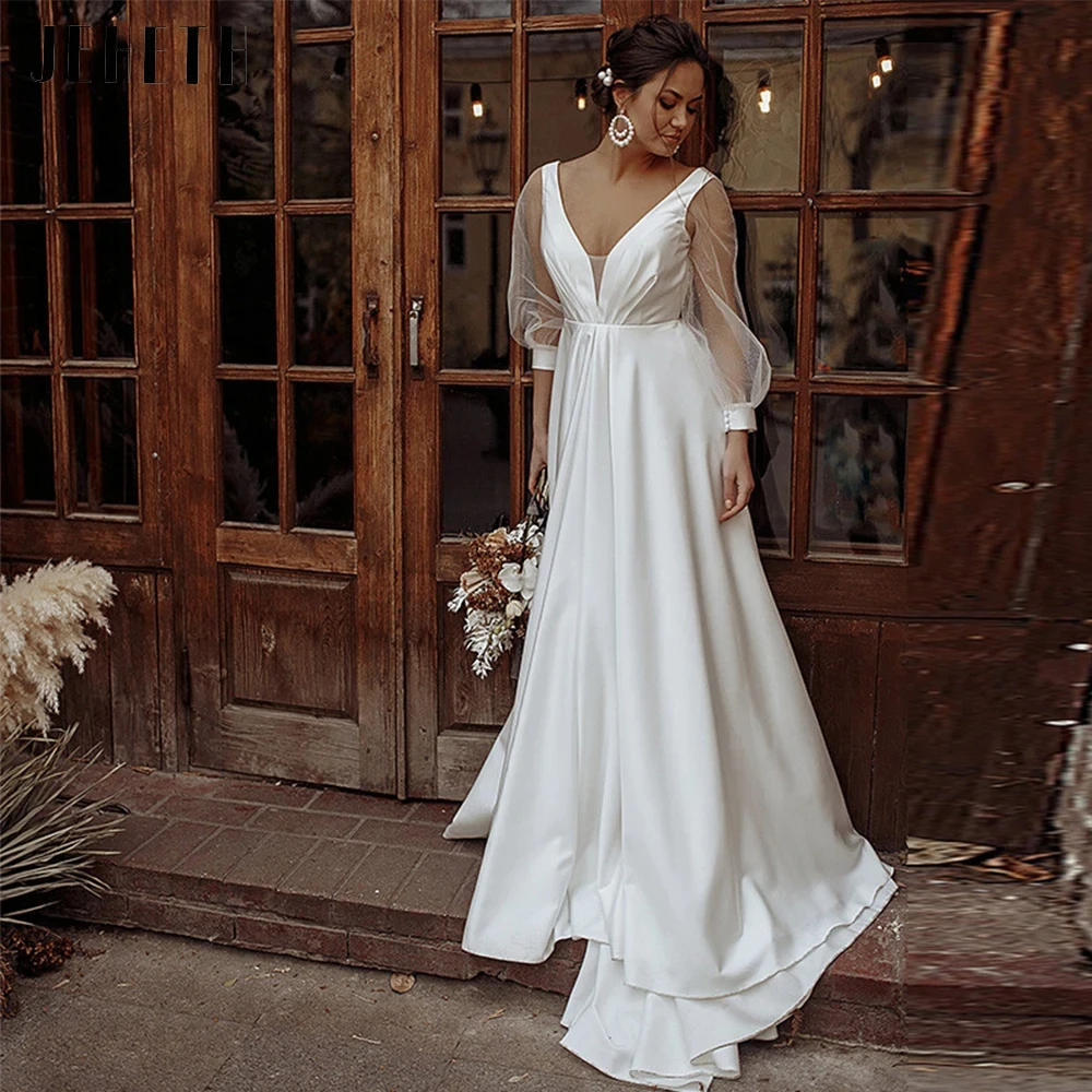 Luxury Backless Boho Wedding Dresses Long Sheer Sleeves V-Neck 2024 Vintage Beach Satin Ruched Bridal Gown Bride Robes De Marié
Luxury Backless Boho Wedding Dresses Long Sheer Sleeves V-Neck 2024 Vintage Beach Satin Ruched Bridal Gown Bride Robes De Marié