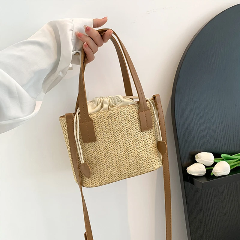 Knit Straw Bucket Tote - Woven Beach Travel Bag with Wrist Handle 2 S7f72accf720f4bf3946d13bcb3e1993aO