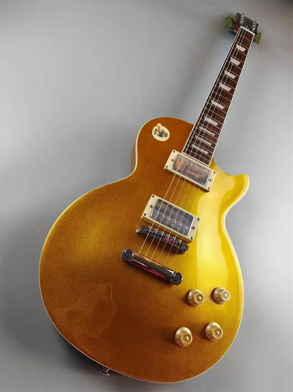 Standard electric guitar, golden top, brown back, bright light, silver pickup, in stock, quick shipping
Standard electric guitar, golden top, brown back, bright light, silver pickup, in stock, quick shipping