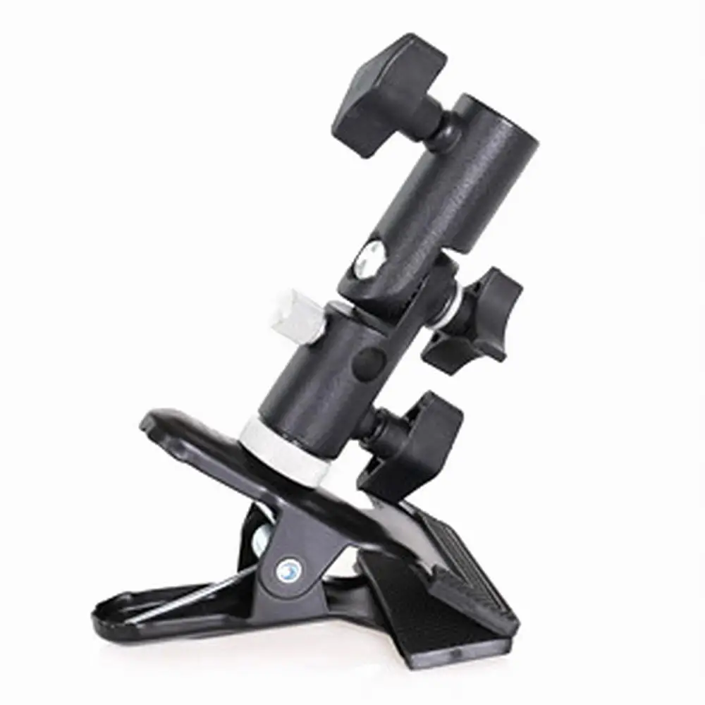 Reflector Clip E-shape Clamp Light Stands Attachment for Photo Shop Reflector and Background Screw Mount Swivel Adapter
Reflector Clip E-shape Clamp Light Stands Attachment for Photo Shop Reflector and Background Screw Mount Swivel Adapter