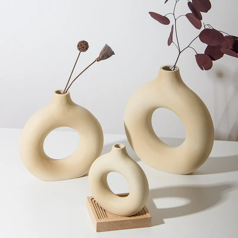 White Pink Black Nordic Wholesale Bulk Round Hollow Doughnut Handcrafted China Rustic Modern White Donut Ceramic Flower Vases
White Pink Black Nordic Wholesale Bulk Round Hollow Doughnut Handcrafted China Rustic Modern White Donut Ceramic Flower Vases
