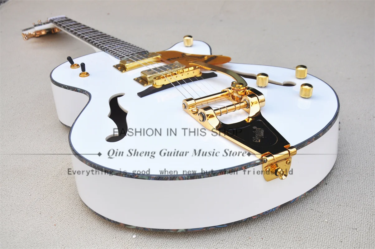 White Electric Guitar 6136 Guitar Semi Hollow Body Mother Seashell Binding Big Tremolo Bridge HH Pickups Gold Tuners
White Electric Guitar 6136 Guitar Semi Hollow Body Mother Seashell Binding Big Tremolo Bridge HH Pickups Gold Tuners