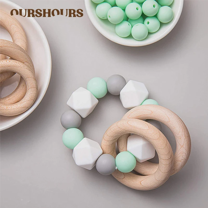 Baby Beech Wooden Teething Toys Silicone Beads Wood Rings Infant Chew Nursing Bracelets for Newborn Gifts Teether Toy Baby Stuff
Baby Beech Wooden Teething Toys Silicone Beads Wood Rings Infant Chew Nursing Bracelets for Newborn Gifts Teether Toy Baby Stuff