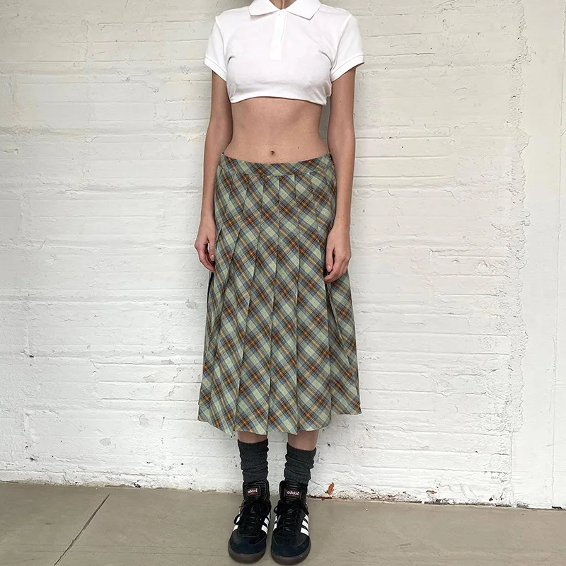 Plaid Mid-length Skirt Women's Preppy Style Low Waist Pleated Skirt Casual Style
Plaid Mid-length Skirt Women's Preppy Style Low Waist Pleated Skirt Casual Style