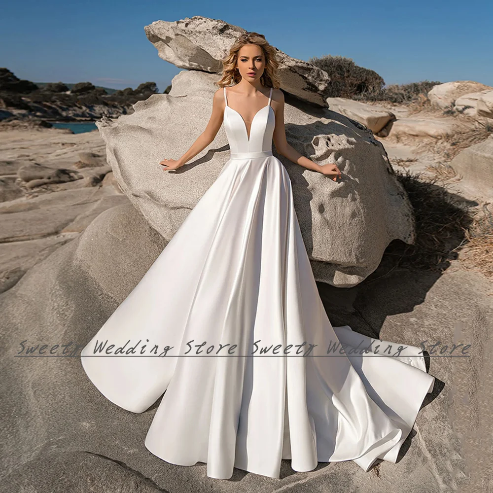 Jiayigong Sexy Satin Wedding Dress Spaghetti Straps Deep V Neck Draped Sweep Train Backless A Line Vestido De Noiva Bridal Gown 
Jiayigong Sexy Satin Wedding Dress Spaghetti Straps Deep V Neck Draped Sweep Train Backless A Line Vestido De Noiva Bridal Gown