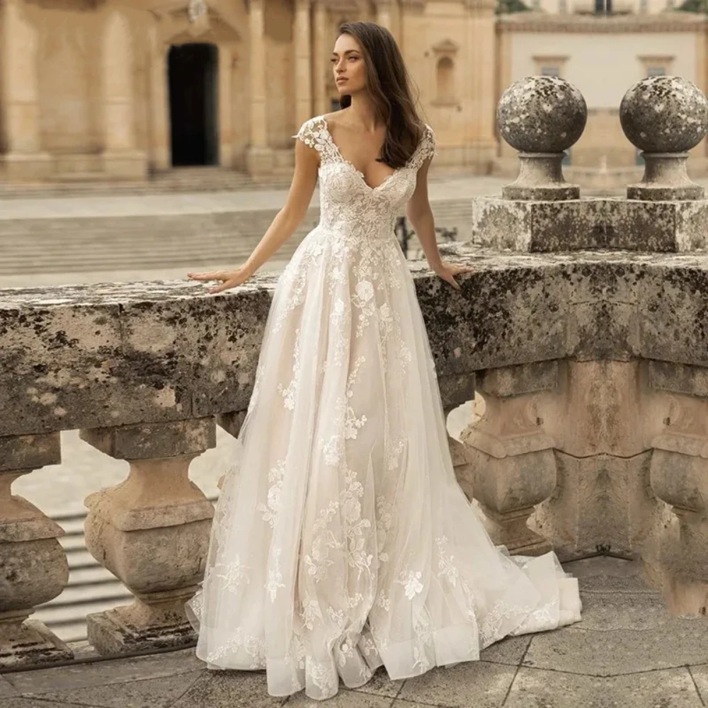 2024 Elegant A-line Applique Sleeveless Wedding Dress Sexy Tulle V-Neck Bride Party Romantic Cap Sleeve Button Suknia ślubna
2024 Elegant A-line Applique Sleeveless Wedding Dress Sexy Tulle V-Neck Bride Party Romantic Cap Sleeve Button Suknia ślubna