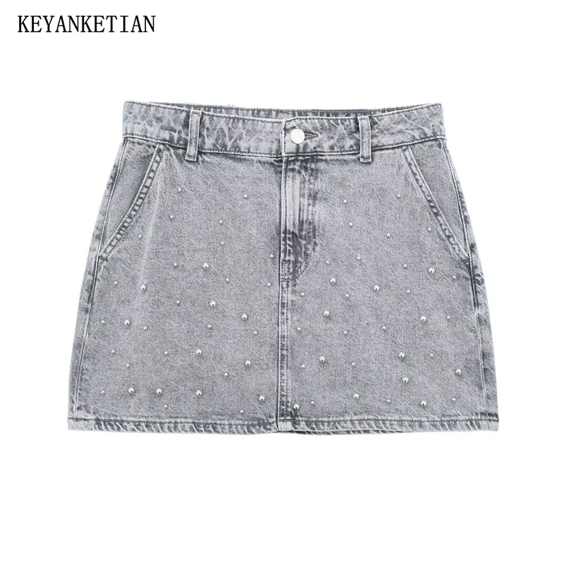 

KEYANKETIAN 2024 New Launch Women Luxury Pearl Decoration Denim Skirt Summer Chic Pockets Slim Zipper Low-rise A-line Mini Skirt