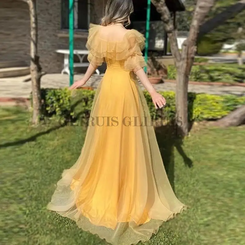Vintage Yellow Square Neck Tulle Prom Dresses Boho A Line Short Ruffles Sleeves Princess Party Gowns Floor Length
Vintage Yellow Square Neck Tulle Prom Dresses Boho A Line Short Ruffles Sleeves Princess Party Gowns Floor Length