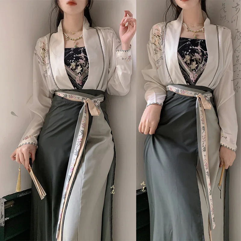 Костюм ханьфу 3 шт. Cami, кардиган и юбка, новый элегантный женский костюм в китайском стиле, Осеннее новое платье, комплект одежды, сексуальный стиль песни, Qipao
Костюм ханьфу 3 шт. Cami, кардиган и юбка, новый элегантный женский костюм в китайском стиле, Осеннее новое платье, комплект одежды, сексуальный стиль песни, Qipao
