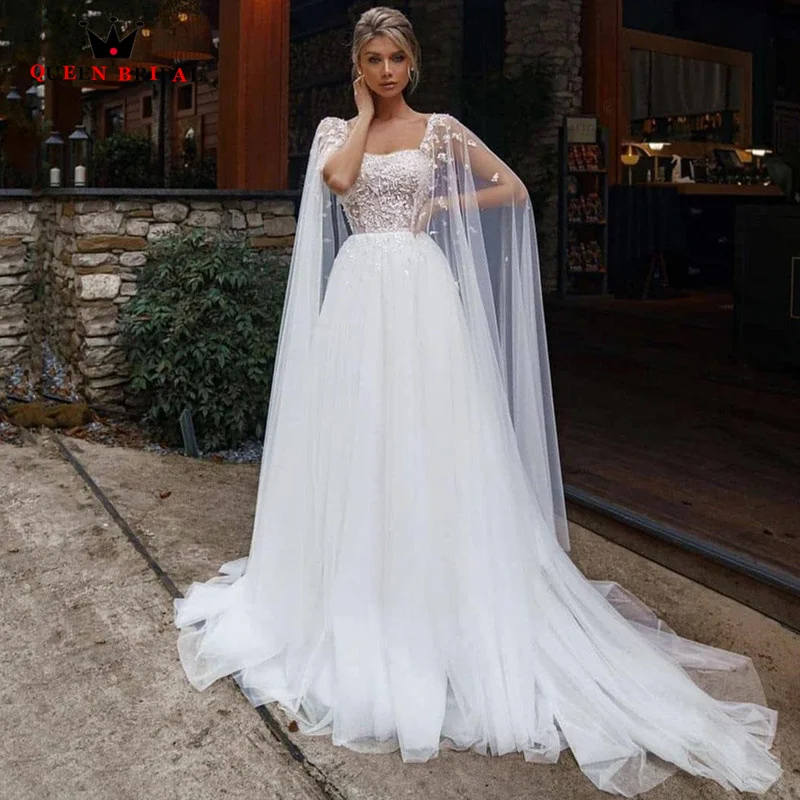 Sexy Ivory Wedding Dresses 2023 A-LINE Tulle Cloak Cape Backless Bride Gowns Pearls Flowers Vestidos De Novia Custom MadeTH09
Sexy Ivory Wedding Dresses 2023 A-LINE Tulle Cloak Cape Backless Bride Gowns Pearls Flowers Vestidos De Novia Custom MadeTH09