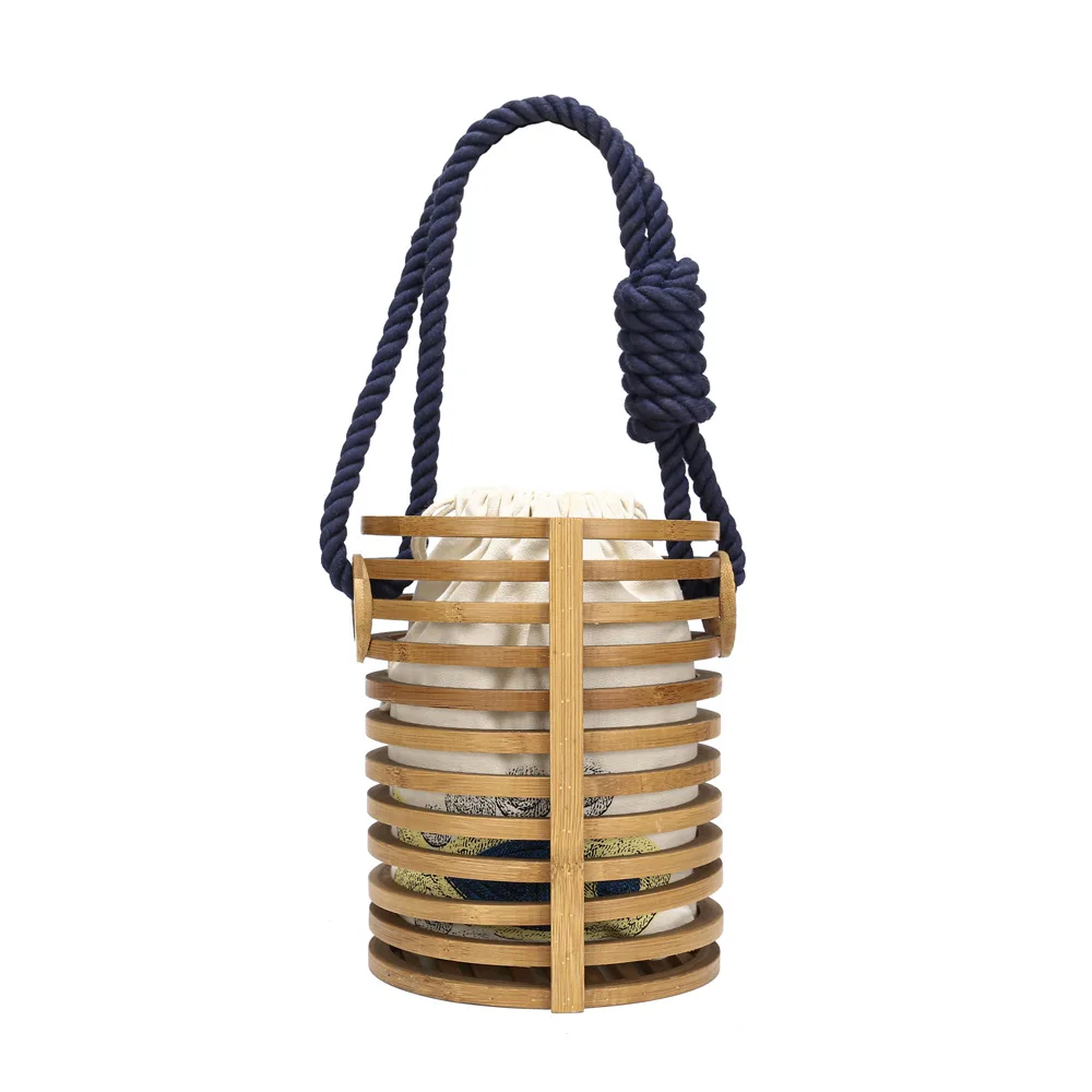 Handmade Wooden Bucket Handbag Luxury Hollow Beach Bags for Women 2023 Summer Woven Rattan Bag Travel Rope Handle Straw Bag Tote
Handmade Wooden Bucket Handbag Luxury Hollow Beach Bags for Women 2023 Summer Woven Rattan Bag Travel Rope Handle Straw Bag Tote