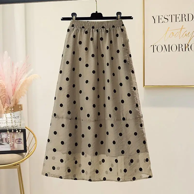 

Sweet and minimalist summer polka dot women's fluffy gauze skirt thin high waisted elastic slim fit mid length A-line skirt