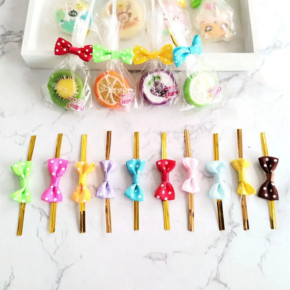 100Pcs New DIY Bow Tie Wrapping Golded Wire Bowknot Binding Wire Lollipop Candy Gift Packaging Bags Fastener Sealing Fixed Ties
100Pcs New DIY Bow Tie Wrapping Golded Wire Bowknot Binding Wire Lollipop Candy Gift Packaging Bags Fastener Sealing Fixed Ties