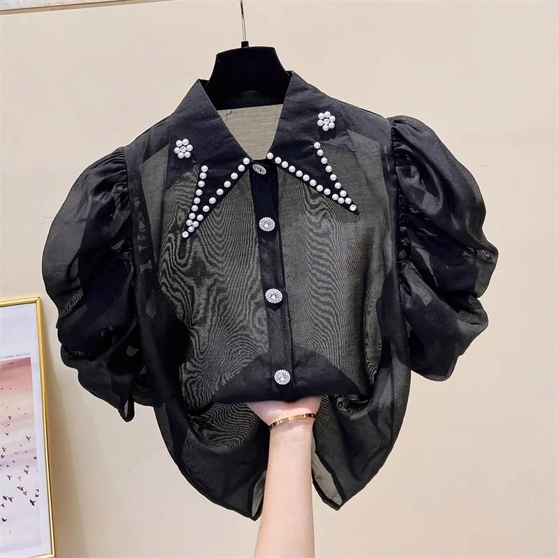 DALMAZZO French Designer Summer Chiffon Shirt Women Beading Lapel Single-Breasted Perspective Chic Tops Female 2023 New
DALMAZZO French Designer Summer Chiffon Shirt Women Beading Lapel Single-Breasted Perspective Chic Tops Female 2023 New