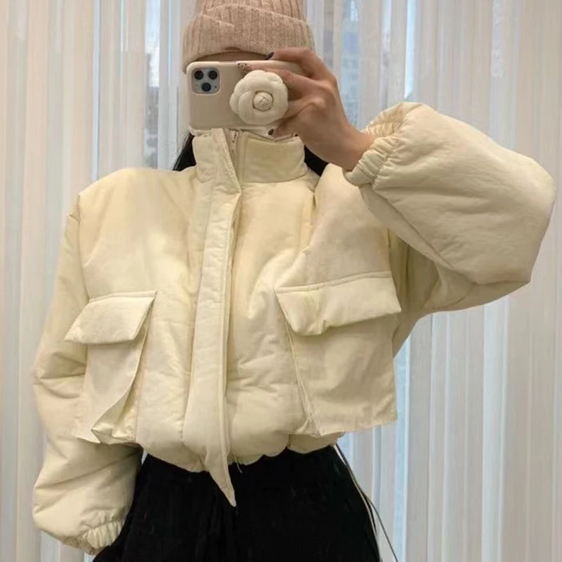 Stand Collar Short Cotton padded jackets female winter Ultra Light Warm parkas women loose drawstring thicken winter jacket 2023
Stand Collar Short Cotton padded jackets female winter Ultra Light Warm parkas women loose drawstring thicken winter jacket 2023