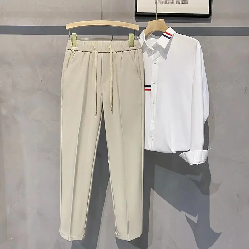 Men's Casual Pants Solid Color Korean Fashion Elastic Waist Loose Straight Trousers Ankle Length Suit Pants
Men's Casual Pants Solid Color Korean Fashion Elastic Waist Loose Straight Trousers Ankle Length Suit Pants