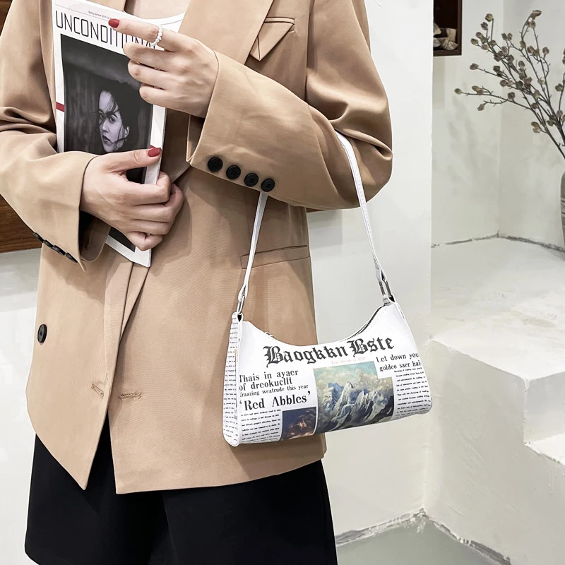Creative Fashion Women Newspaper Letter Printing PU Leather Shoulder Underarm Bag Casual Ladies Small Purse Buckle Handbags
Creative Fashion Women Newspaper Letter Printing PU Leather Shoulder Underarm Bag Casual Ladies Small Purse Buckle Handbags