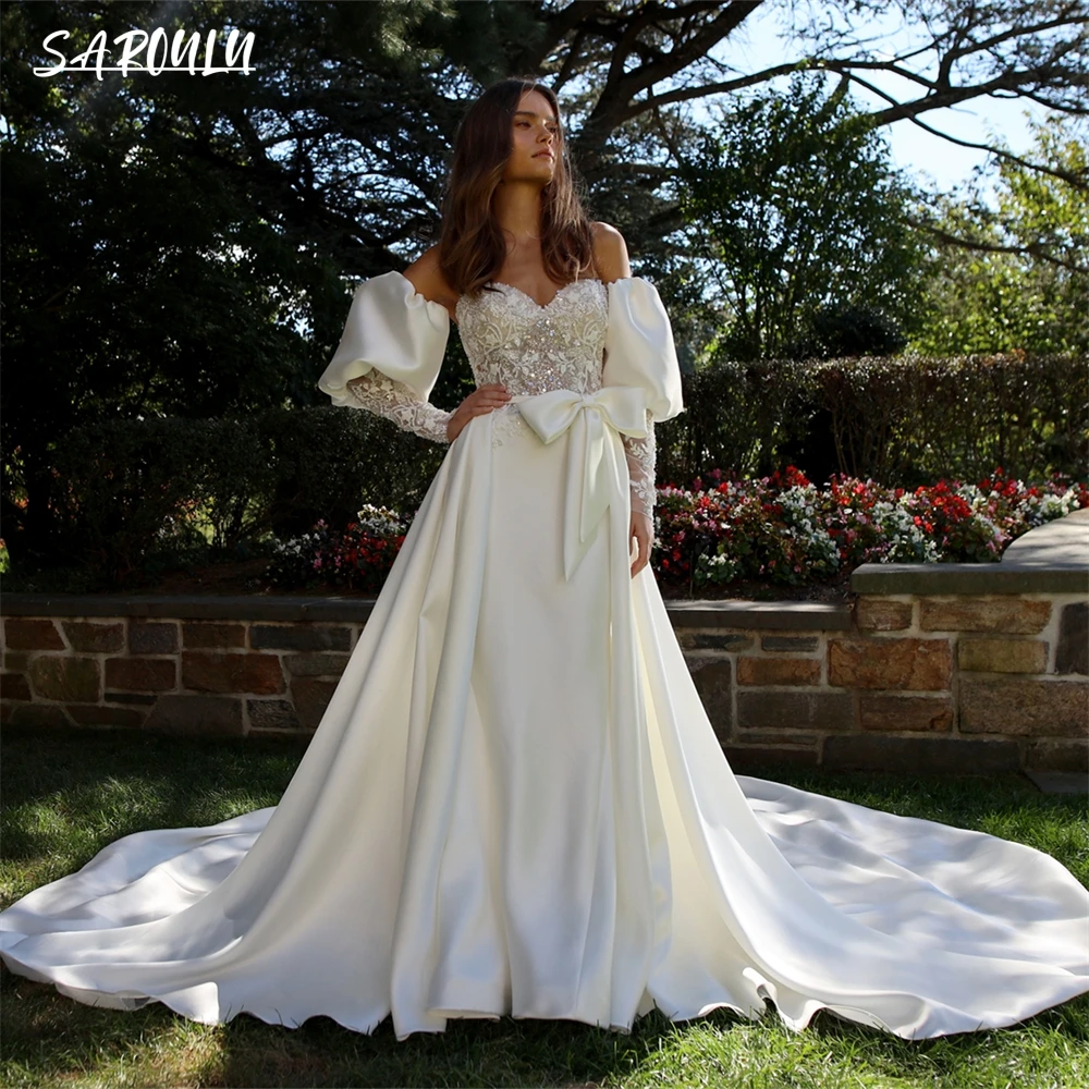 Hand Beaded Sequins Wedding Dress Satin Puff Sleeve With Bow Bride Dresses Mermaid Removable Chapel Train Bridal Wedding Gown
Hand Beaded Sequins Wedding Dress Satin Puff Sleeve With Bow Bride Dresses Mermaid Removable Chapel Train Bridal Wedding Gown