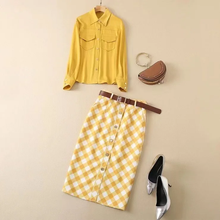 New European and American women's wear for winter 2022 Long sleeved yellow shirt Plaid belt skirt Fashion suits 
New European and American women's wear for winter 2022 Long sleeved yellow shirt Plaid belt skirt Fashion suits