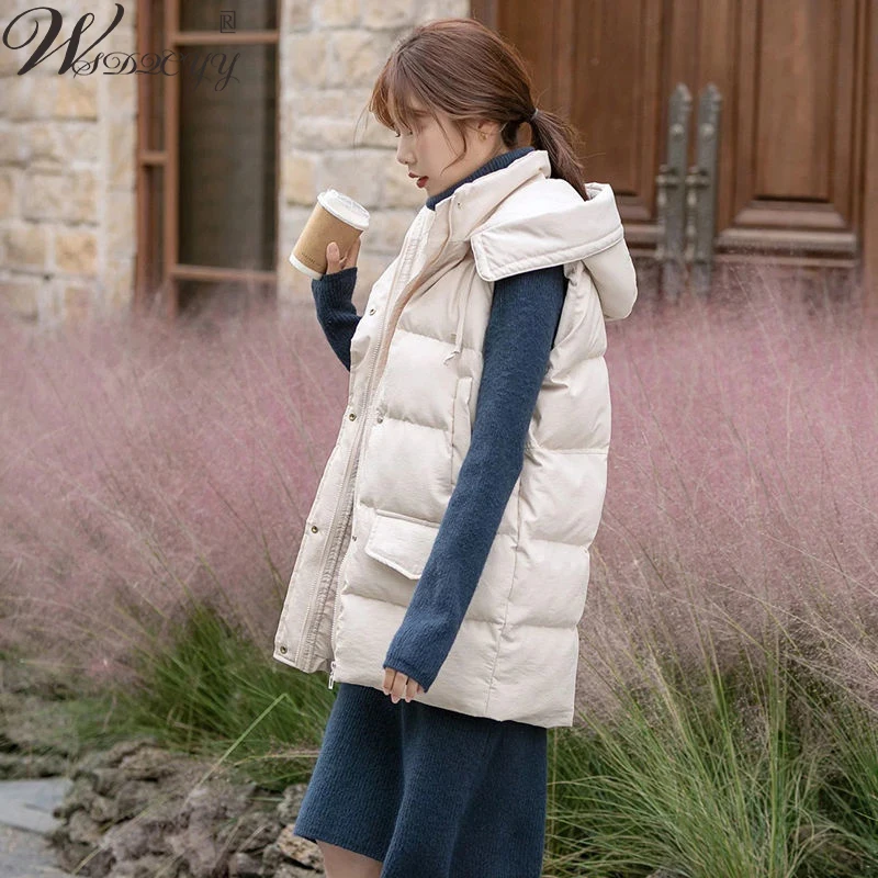 Hooded Cotton Down Vest Women Korean Fashion Long Sleeveless Jacket Autumn Winter Solid Loose Outwear Thick Windproof Waistcoat
Hooded Cotton Down Vest Women Korean Fashion Long Sleeveless Jacket Autumn Winter Solid Loose Outwear Thick Windproof Waistcoat