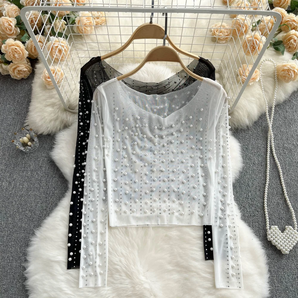 

Clothland Women Sexy Beading Pearl Lace Blouse Long Sleeve See Through Shirt Transparent Chic Tops Blusa Mujer LB007