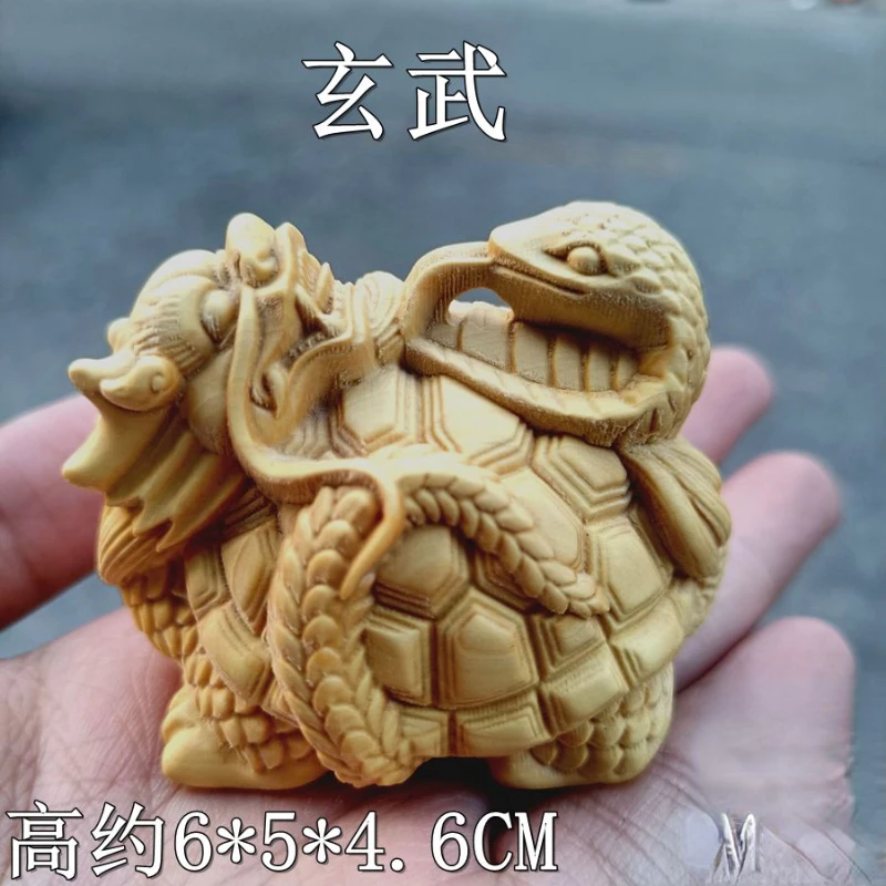 Boxwood carving dragon turtle decoration basaltic charm adornment turtle snake square god beast car arrangement handle piece 
Boxwood carving dragon turtle decoration basaltic charm adornment turtle snake square god beast car arrangement handle piece