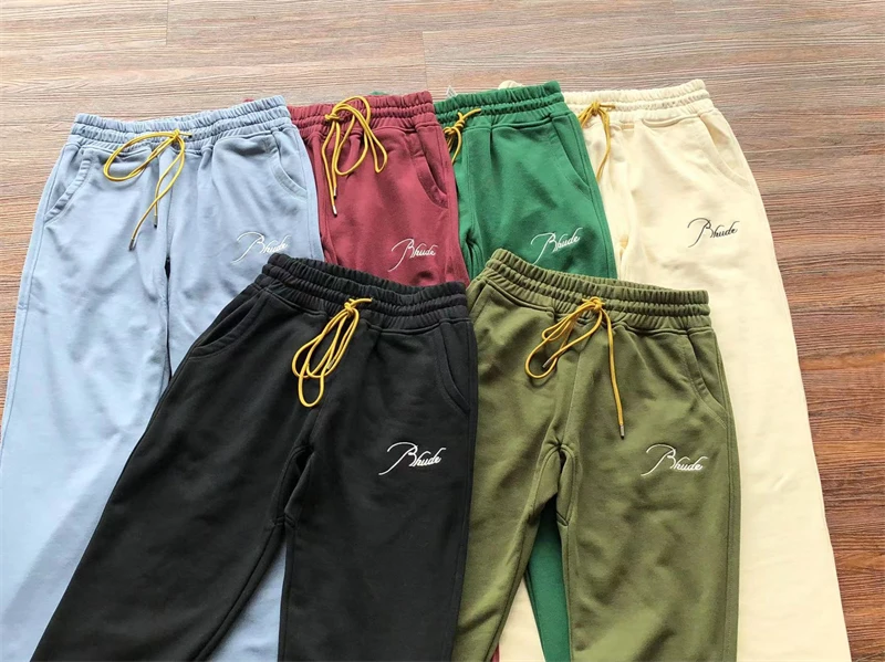 

23SS New Embroidery Rhude Sweatpants Men Women Best Quality Loose Drawstring Joggers Casual Pants Jaqueta