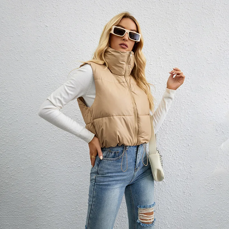 2023 autumn and winter new European and American style fashion short solid color down cotton vest slim high collar loose vest 
2023 autumn and winter new European and American style fashion short solid color down cotton vest slim high collar loose vest