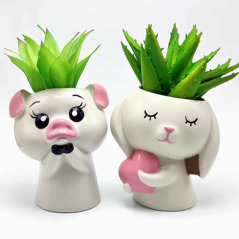 Holding love rabbit piggy vase silicone mold DIY making resin plaster desktop flower pot plant mold home decoration tool
Holding love rabbit piggy vase silicone mold DIY making resin plaster desktop flower pot plant mold home decoration tool