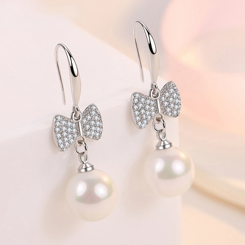 Женские длинные серьги из серебра 925 пробы, с жемчугом 
Женские длинные серьги из серебра 925 пробы, с жемчугом