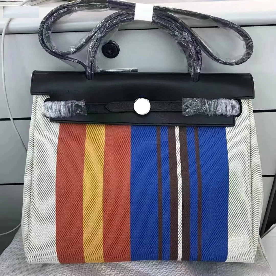 New color scheme fashionable luxury handbag waterproof canvas bag casual large capacity classic handbag 31cm
New color scheme fashionable luxury handbag waterproof canvas bag casual large capacity classic handbag 31cm