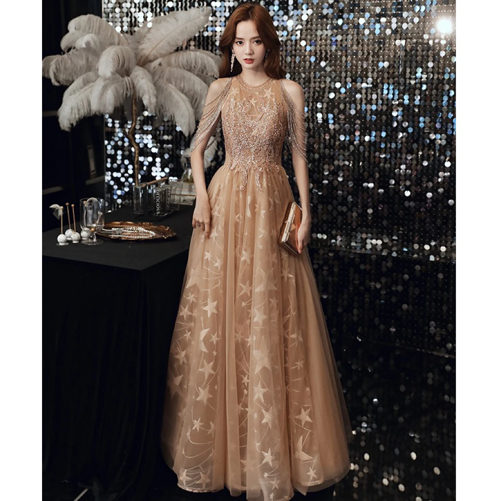 Sexy Halter Celebrity Dress Champagne Stars Luxury O Neck Bead Tassel Appliques A-Line Backless Long Women Formal Evening Gowns
Sexy Halter Celebrity Dress Champagne Stars Luxury O Neck Bead Tassel Appliques A-Line Backless Long Women Formal Evening Gowns