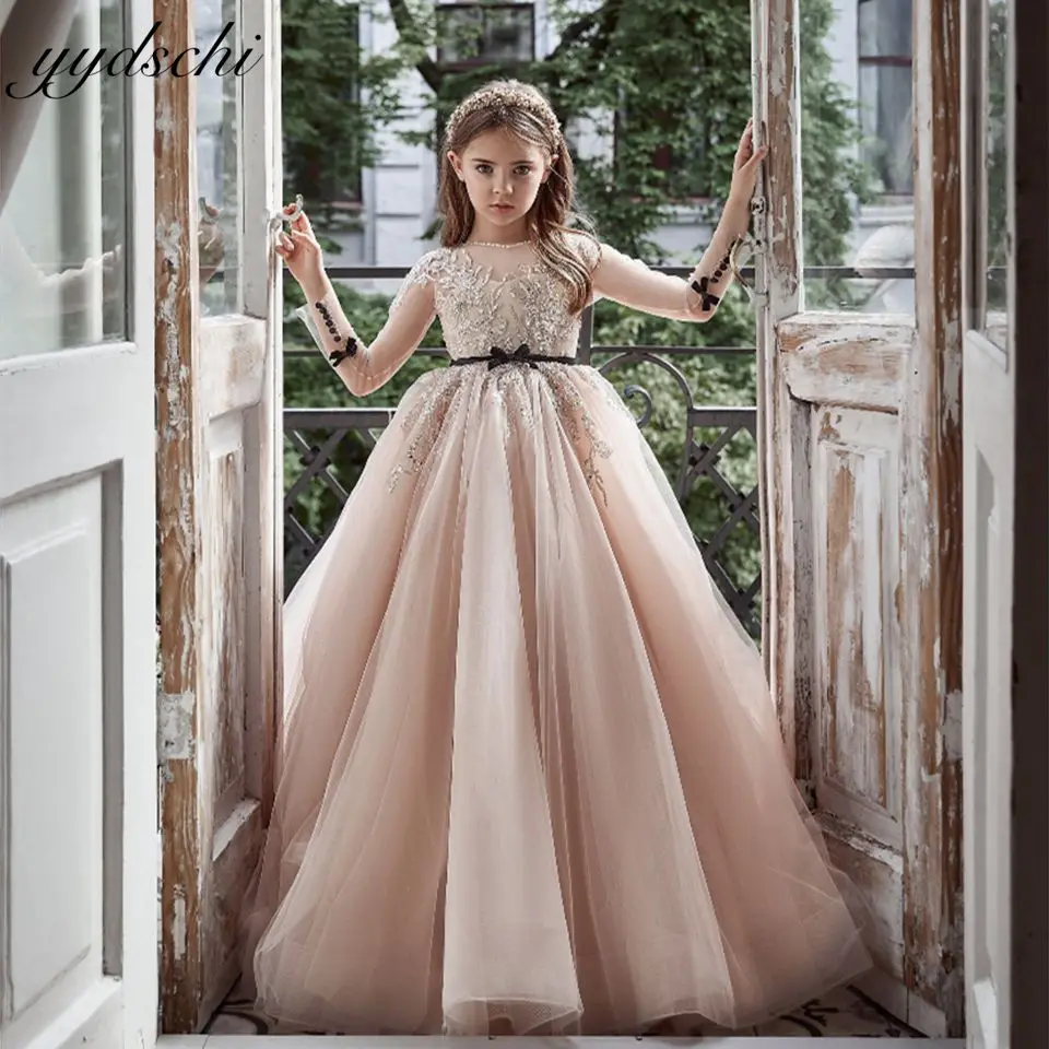 

Elegant Nude Color Illusion Long Sleeves Flower Girl Dress 2023 Princess Lace Appliques Sparkle Beaded Kids First Communion Gown