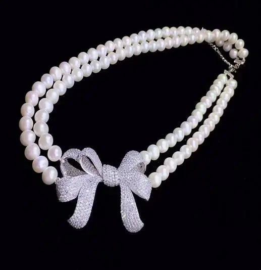 17' 18" 2 layers of large bow cubic zirconia micro-set with bright pearl choker for women elegant party accessories birthd
17' 18" 2 layers of large bow cubic zirconia micro-set with bright pearl choker for women elegant party accessories birthd