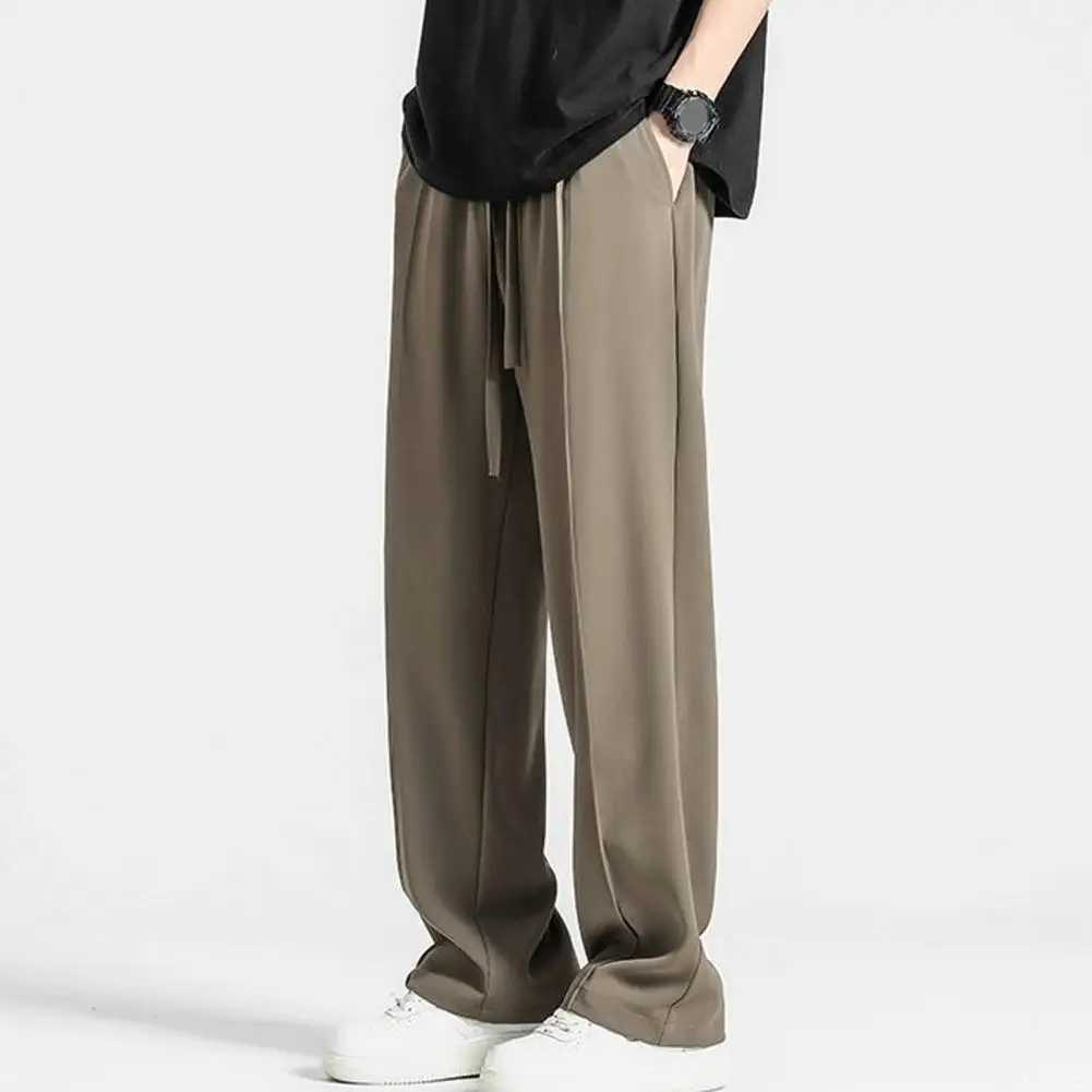 

Мужские спортивные штаны, свободные быстросохнущие Костюмные брюки из вискозы, с поясом на резинке, с широкими штанинами и боковыми карманами, однотонные Длинные