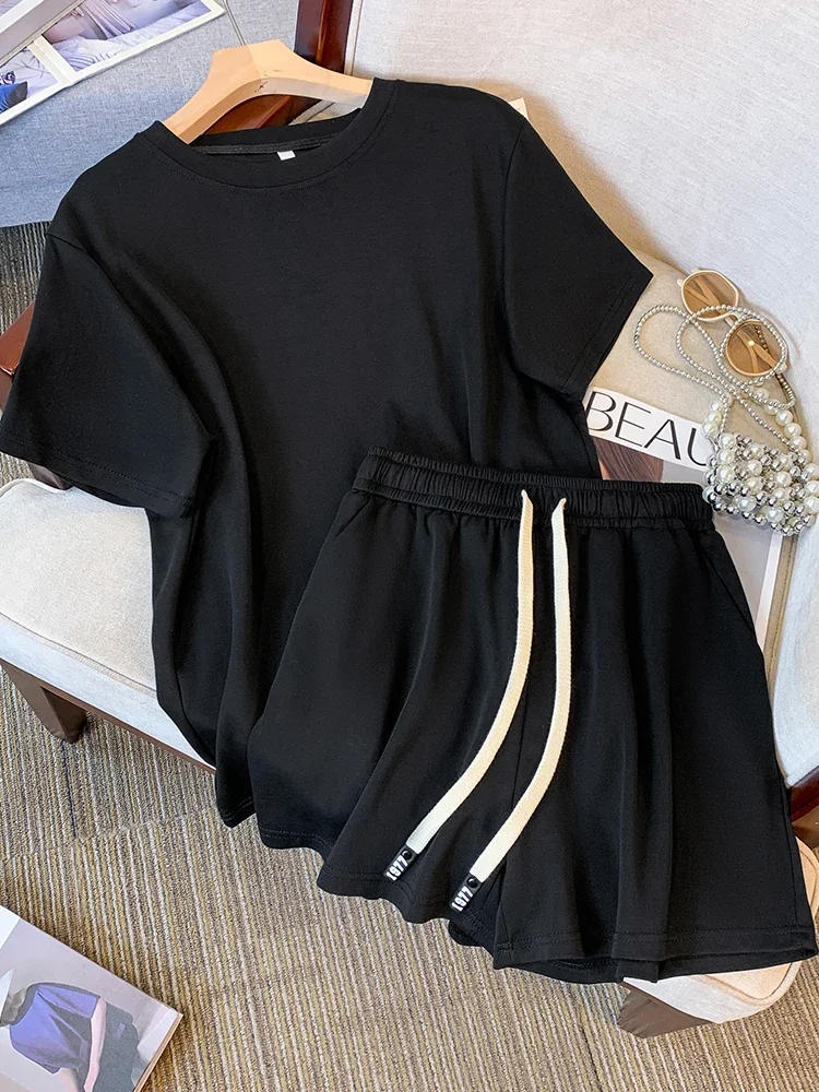 Повседневный модный спортивный костюм для женщин 2024 летняя черная футболка с коротким рукавом Топ с эластичным поясом штаны для бега спортивный костюм комплект из двух предметов
Повседневный модный спортивный костюм для женщин 2024 летняя черная футболка с коротким рукавом Топ с эластичным поясом штаны для бега спортивный костюм комплект из двух предметов