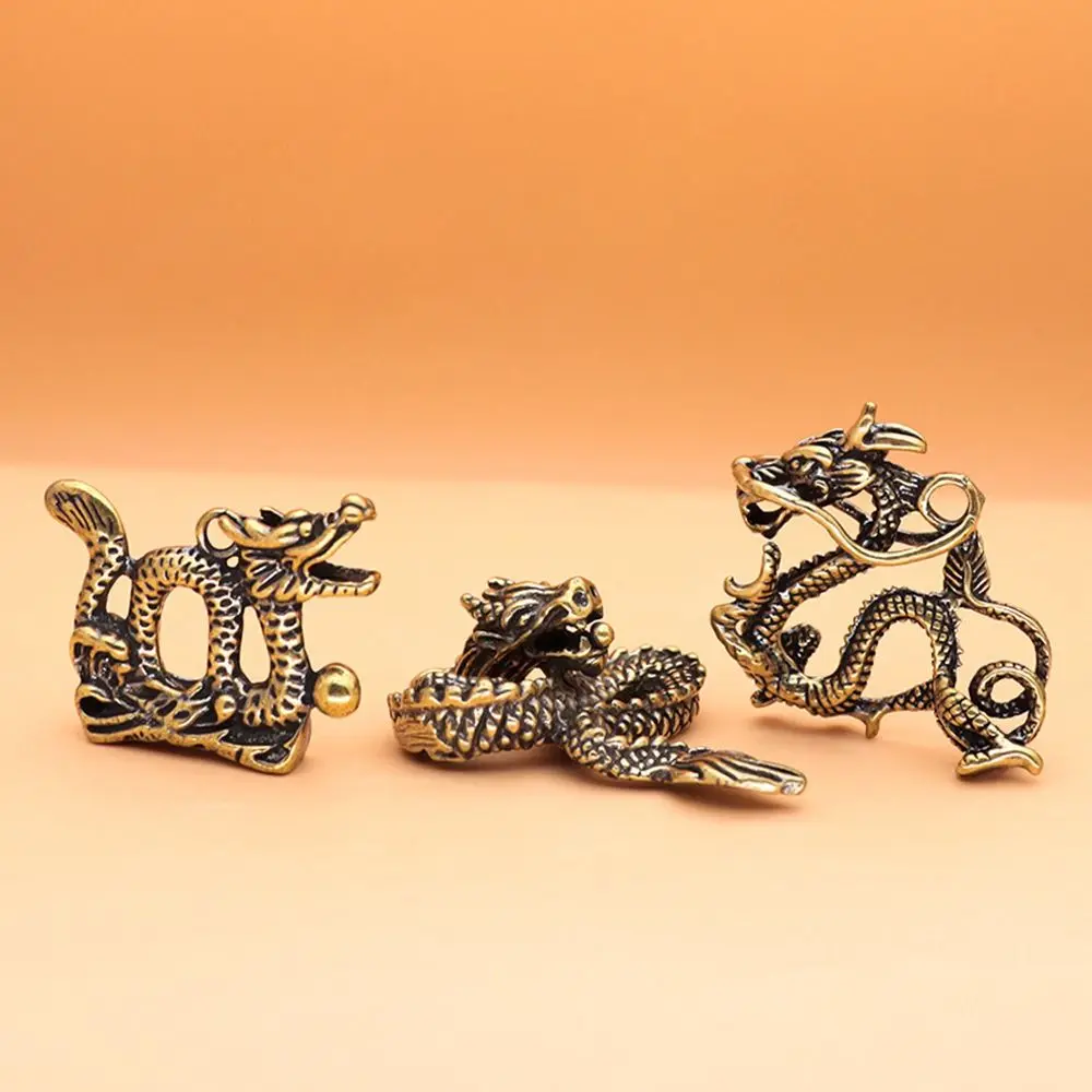 Lucky Twelve Zodiac Dragon Pendant Brass Crafts Mini Chinese Dragon Figurines Handcraft Zodiac Dragon Ornaments Desktop Decor
Lucky Twelve Zodiac Dragon Pendant Brass Crafts Mini Chinese Dragon Figurines Handcraft Zodiac Dragon Ornaments Desktop Decor