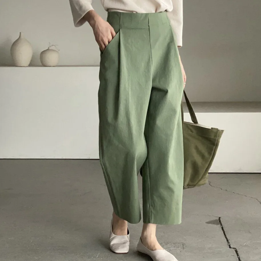 

South Korea's autumn and winter niche all-in-one high-waisted lean pleated design sense of solid color wide-leg casual pants